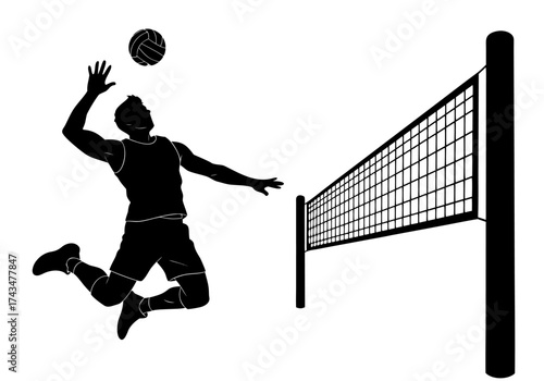 Silhouette of a male volleyball player jumping to spike the ball over the net in a dynamic action shot