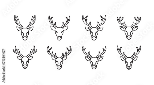 Collection of stylized deer head silhouettes for design projects vector