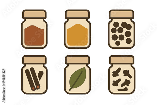 Set of kitchen jars containing different aromatic culinary spices and seasonings