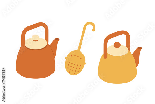 Warm colored kitchen utensils including two teapots and a metal tea infuser strainer