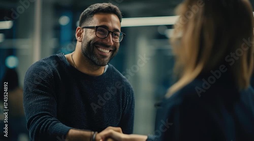 Professional handshake between colleagues.