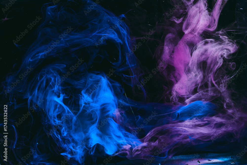 Obraz premium Abstract colorful background. Moving flow of blue purple paints, multicolored fluid liquid art