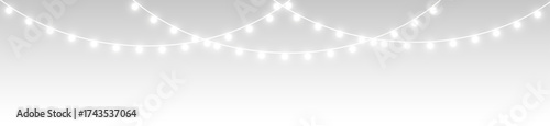 png white Christmas garland with warm glowing holiday lamps
