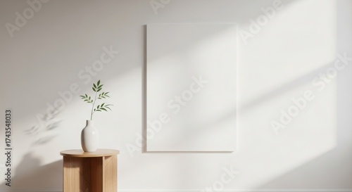 Minimalist Wall Mockup with Wooden Table, White Vase, and Green Leaves in Sunlight