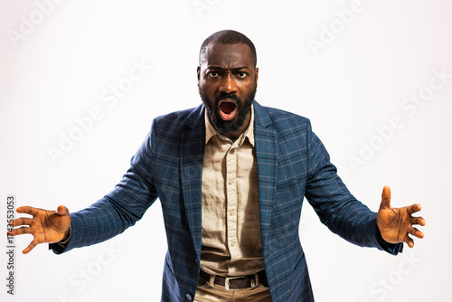 Bild auf Leinwand Portrait of angry African-american businessman who is shouting.