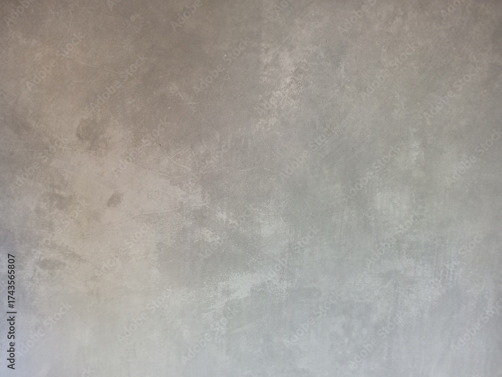 Fototapeta premium Mottled Neutral Gray Polished Concrete Wall Grunge Texture