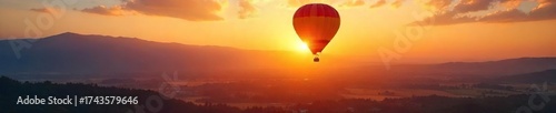 Hot Air Balloon Sunrise Majestic Flight Over Tranquil Landscape, Perfect for Travel and Adventure