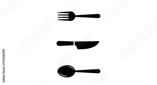 Set of cutlery including fork, knife, and spoon isolated on white background