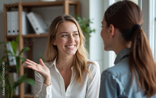 Cheerful woman speaking with colleague. High quality