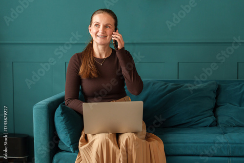 Portrait of woman working from home on laptop