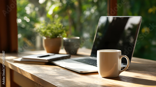 A quiet home workspace with a laptop, coffee, and a notebook by the window, symbolizing remote work, digital isolation, and blurred work-life boundaries in modern society.