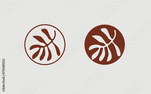 Circular frame botanical vector logo with tropical leaf design in brown color for minimal, natural design projects.
