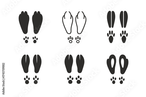 Rabbit Track Logos. Animal footprints. Set Logo of rabbit tracks: two large hind feet with small front paws. harmonious logo variations of the same emblematic