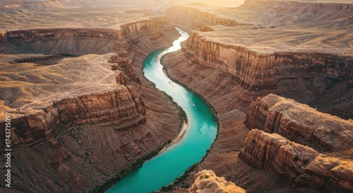 Aerial view of the colorado river flowing through the grand canyon at sunset