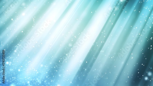 Soft diagonal light beams illuminate sparkling particles on a cool blue background.