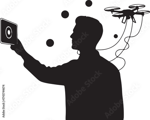 Silhouette of a person controlling a drone with a tablet device symbolizing modern technology and aerial photography