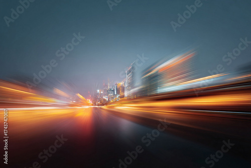 Abstract image of city lights at night, showing motion and speed. Ideal for backgrounds, travel themes, or conveying innovation and forward movement.