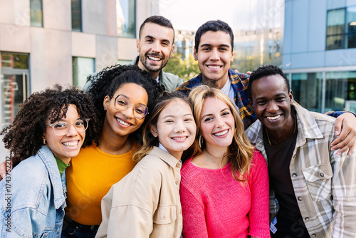 Wallpaper Mural Portrait of young group of diverse people smiling at camera standing outdoor. Happy millennial college students enjoying time together, social gathering and hanging out at city street. Torontodigital.ca