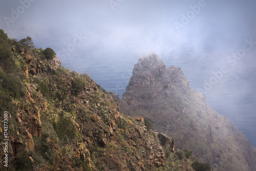 Dramatic Cliffs Rise Above the Ocean Mist on La Gomera in the Canary Islands