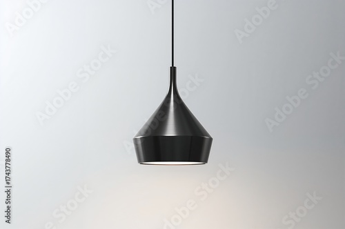 Hanging light fixture on a plain white backdrop