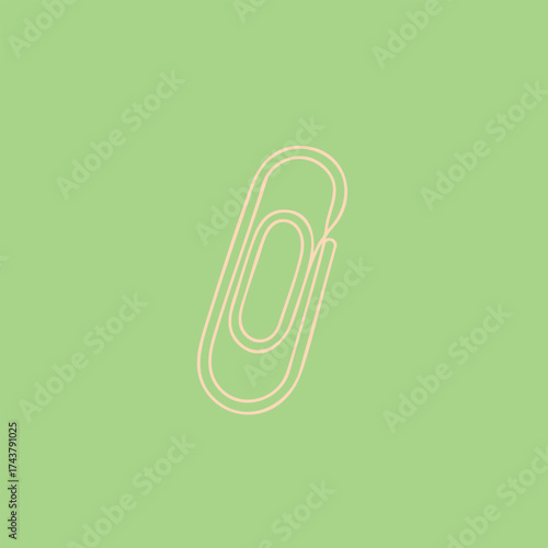 Close-up of a single paperclip resting on a pastel green with a minimalist aesthetic