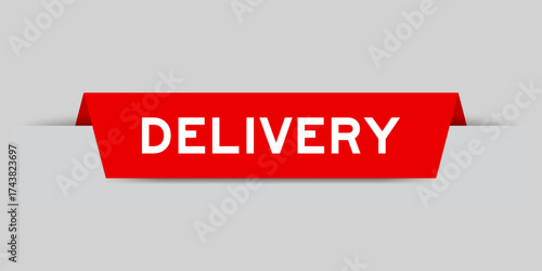 Red color inserted label with word delivery on gray background