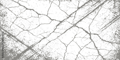 An old, rusty barbed wire fence with a grunge texture pattern against a cracked concrete wall background