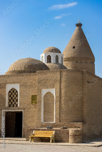 Exterior view of the Museum of the History of Bukhara Water Supply, Uzbekistan. Museum is located in one of the Chashma-Ayub mausoleum, built 1379-1380. Inform plaque with Uzbek, Russian, and English.