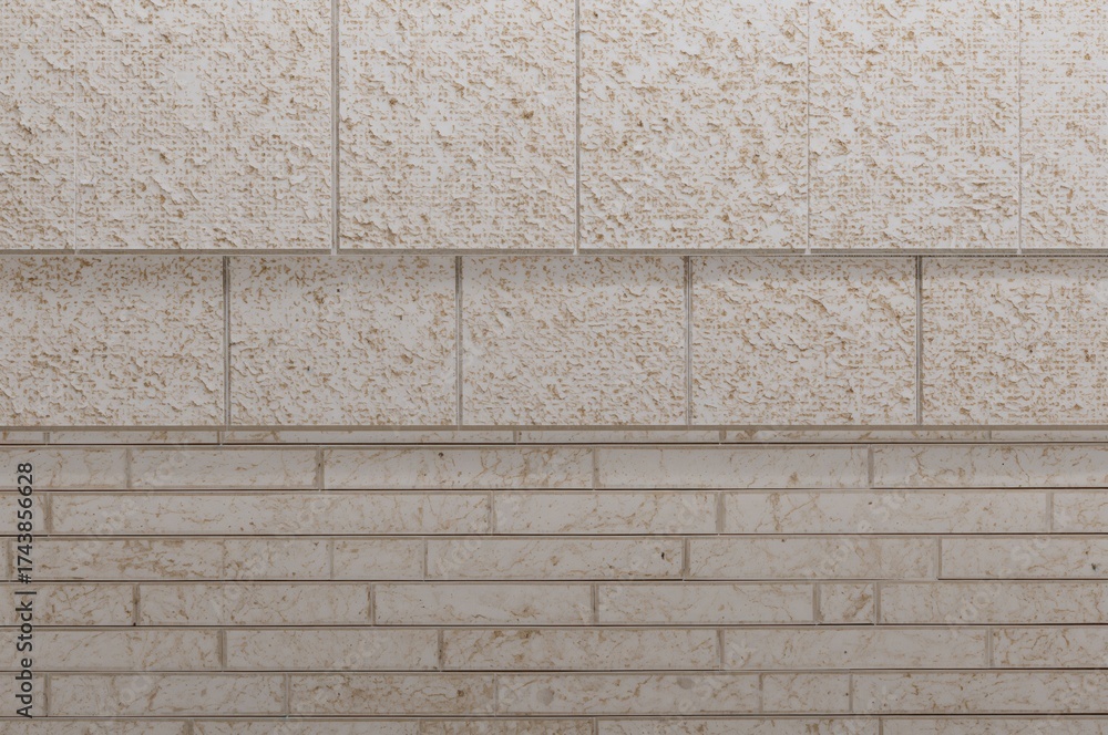 Fototapeta premium Patterned wall with white subway tiles