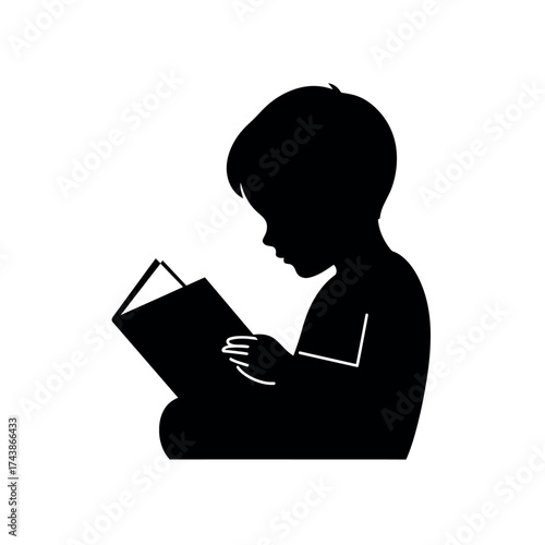 Silhouette of a Child Reading a Book with Focus.