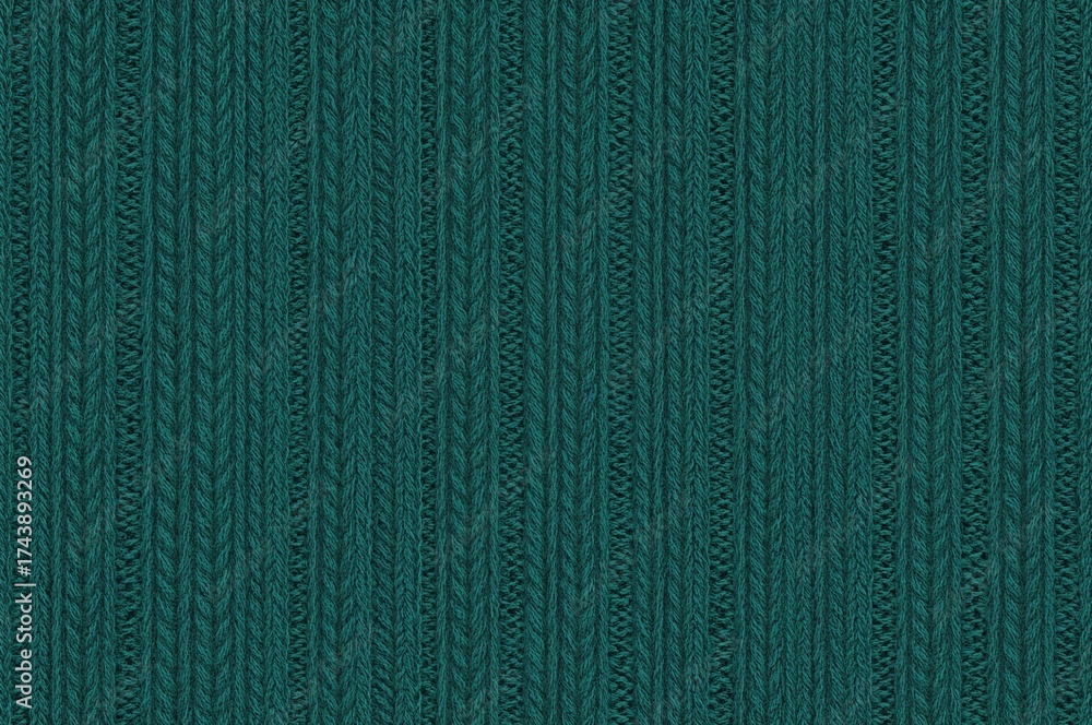 Fototapeta premium Continuous knitted textile featuring geometric cable motifs. Cotton and wool blend fabric sample in teal. Rustic winter material pattern.