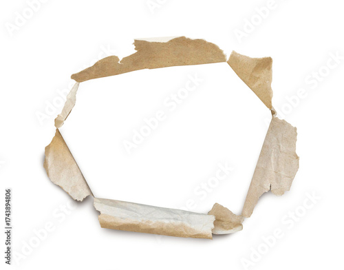 Torn hole on brown paper. The torn kraft brown paper hole. Brown paper with torn hole isolated