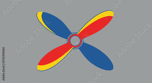 A colorful propeller design featuring red, blue, and yellow blades rotating on a grey backdrop