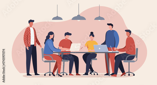 Diverse business team collaborating in a modern office meeting with laptops fostering teamwork and productivity