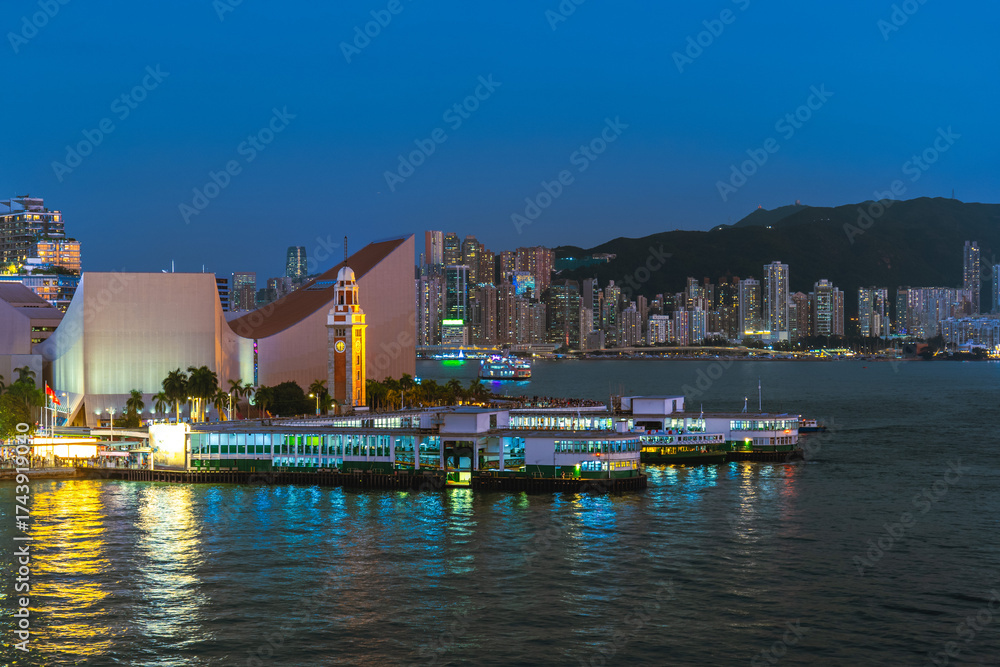Naklejka premium The Clock Tower on the southern shore of Tsim Sha Tsui, Kowloon, Hong Kong, China