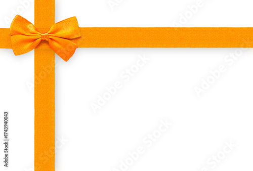Foto Bright satin orange ribbon and bow isolated on a transparent background, creating a gift-wrap design in the top-left corner
