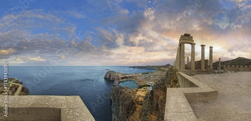 Breathtaking view from the Acropolis of Lindos with columns of the Temple of Athena at sunset and dramatic sky, Acropolis, Lindos, Rhodes, Island, Greece
