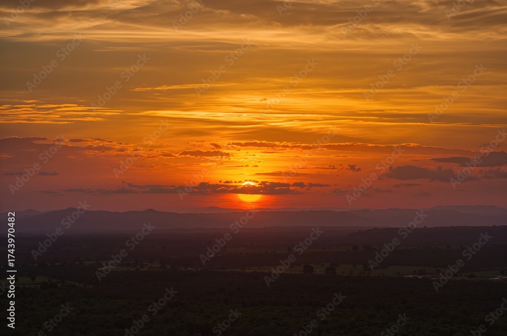 Fototapeta premium Sunset Glow in Shades of Orange and Yellow
