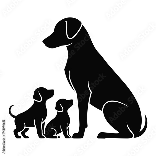 Silhouette of a mother dog sitting with two small puppies beside her in a loving pose.