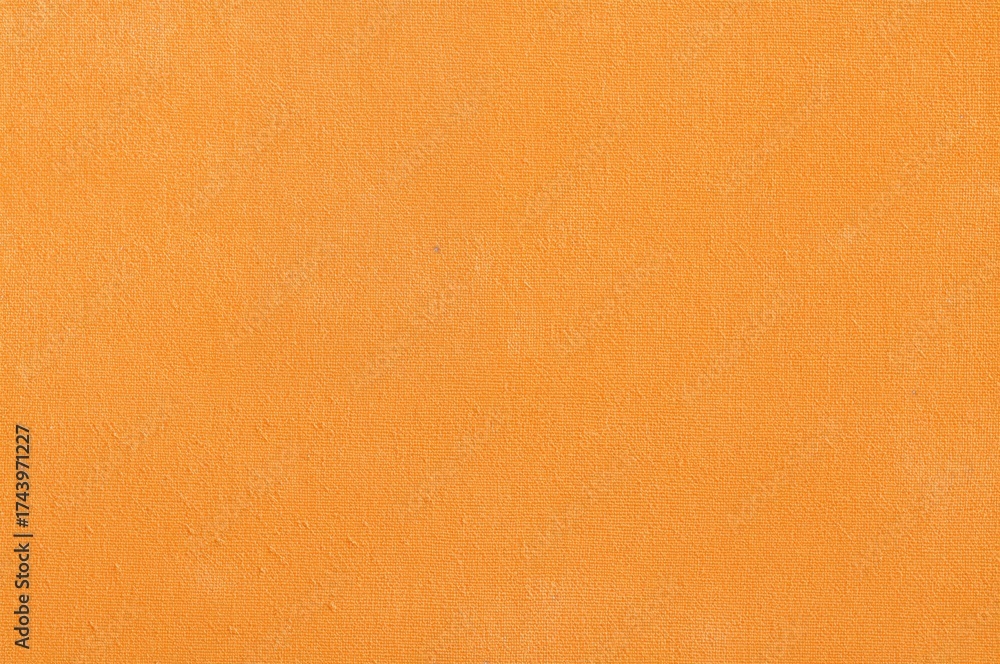 Fototapeta premium Delicate patterned texture on orange fabric