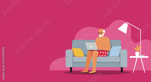 Relaxed senior man in shorts uses laptop on sofa Remote work digital leisure modern lifestyle
