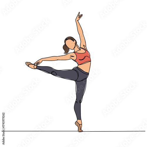 Female ballet dancer performing an elegant pose on stage  