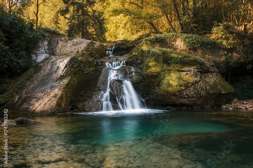 A tiny waterfall tumbles do...