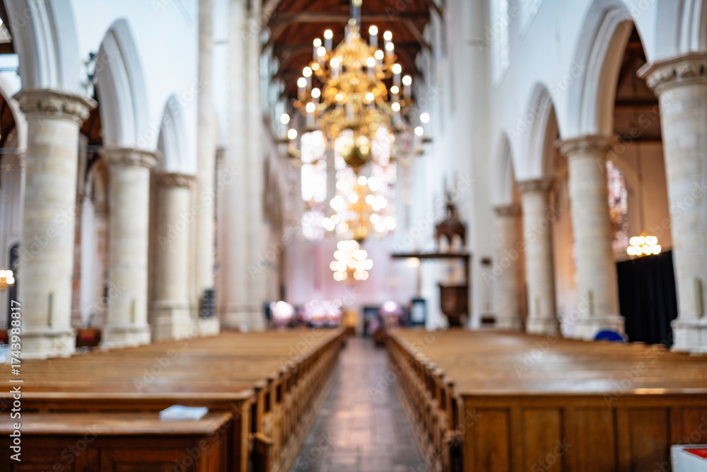 Fototapeta premium Blurry or defocused medieval European church interior. Wide angle view, abstract background, no people, selective focus