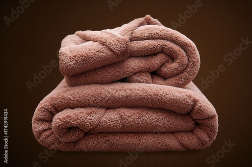 Cozy pile of neatly folded ...