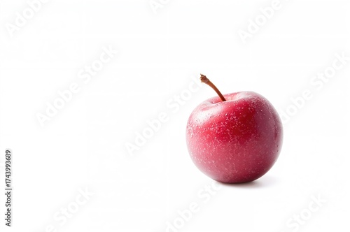 Single plum fruit on a plai...