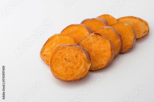 Wallpaper Mural Isolated sweet potato pieces on a white backdrop with sharp focus throughout Torontodigital.ca