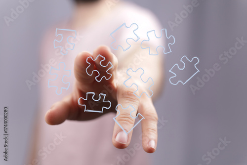 Hand interacting with puzzl...