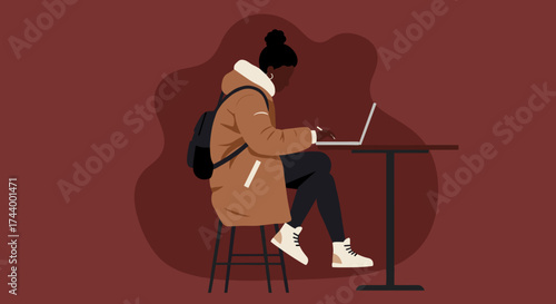 Young woman in winter coat working on laptop at table Remote work student freelancer