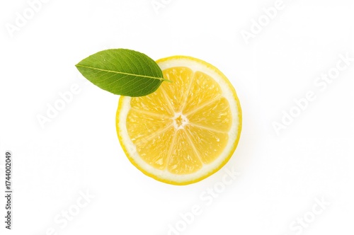 Lemon wedge on a plain whit...